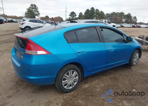 2011 Honda Insight from USA, damaged, VIN JHMZE2H32BS001207